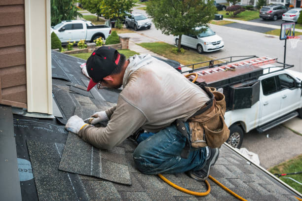 Professional Storm Damage Roof Repair technician working in Bellevue, MI
